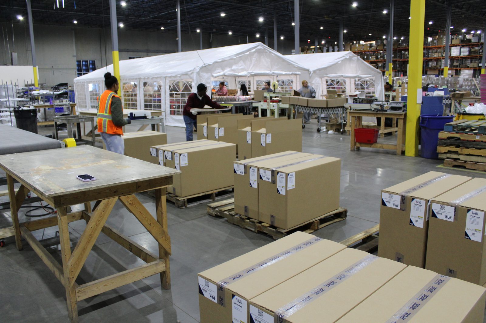 Productiv warehouse team packing and preparing orders for shipment in Charlotte facility
